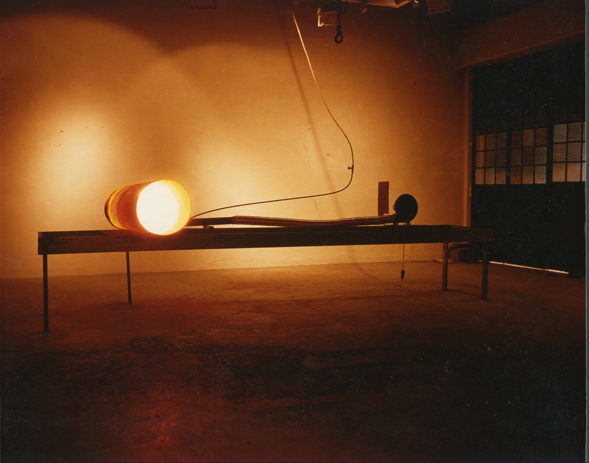 Thanasis Totsikas, Untitled, metal cylinder, pure petroleum, fan, 500 x 120 x 120 cm (196 7/8 x 47 1/4 x 47 1/4 in). Installation view, Hephaestus’ Workshop, Epikentro Gallery, Patras, 1989